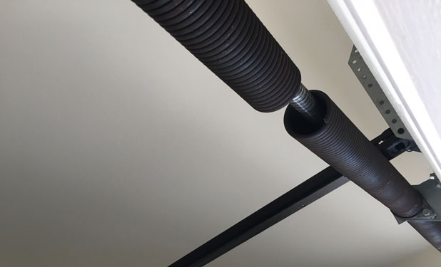 Broken garage door torsion spring Providence